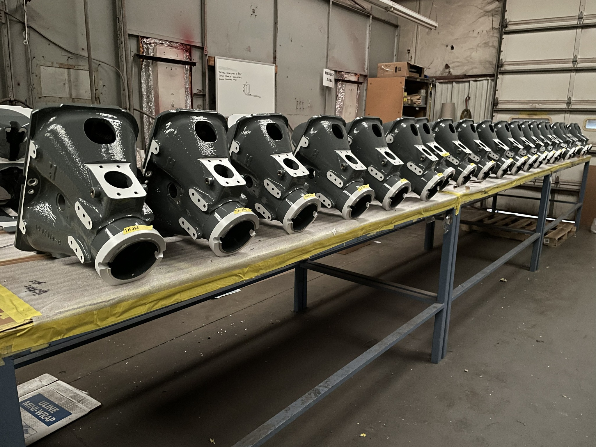 Production run of gray-coated industrial housings finished by Carolina Finishing